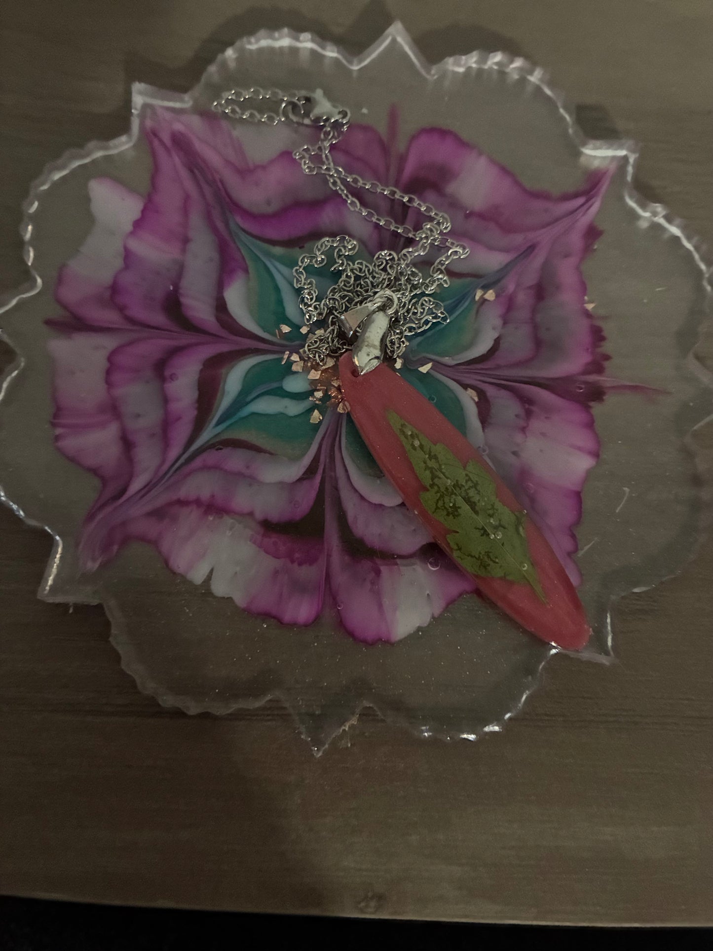 Green leaf on pink pendent