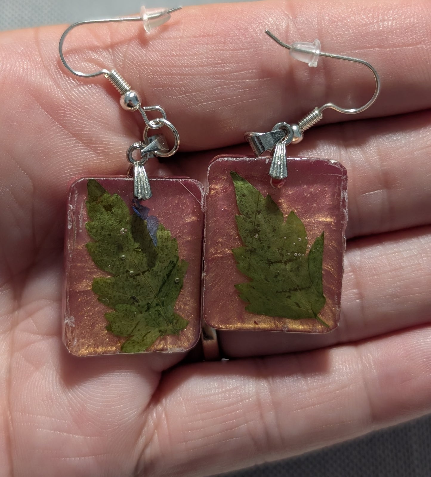 Green Leaf on Rose Gold Background