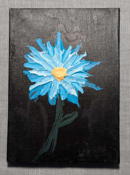 Blue Flower on Black Background