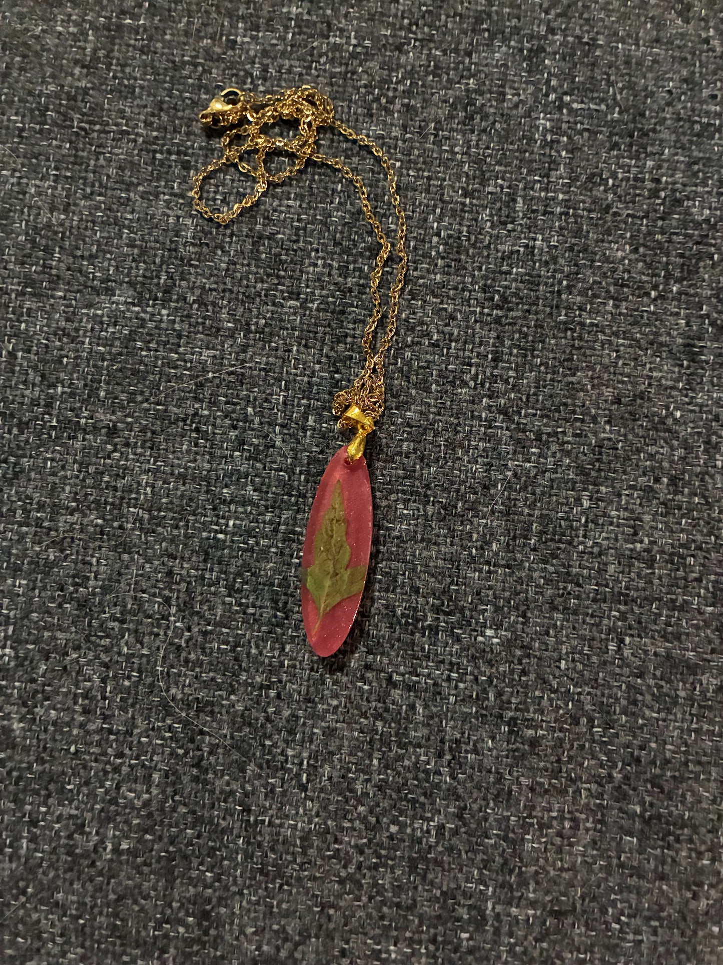Green leaf on pink pendent