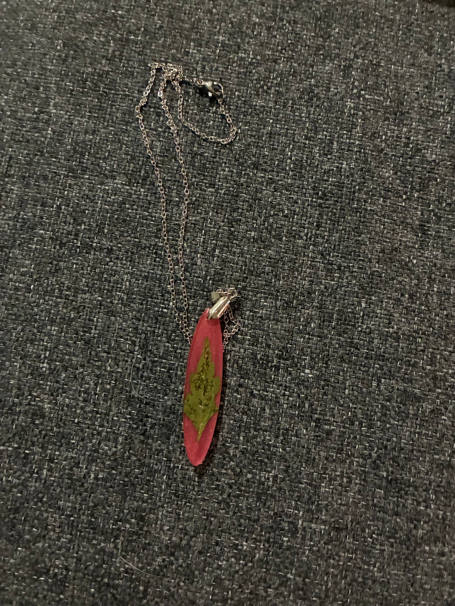 Green leaf on pink pendent