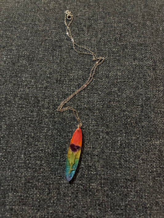 Rainbow necklace with purple flower